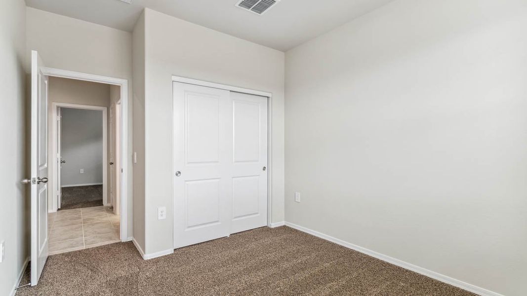 Spacious, unfurnished interior of a new home in Heartland Ranch, Coolidge (Image 22).