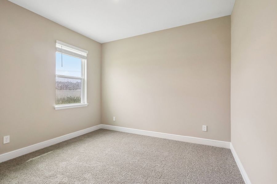 Spacious, unfurnished interior of a new home in Legends Preserve - Signature Series, Daytona Beach (Image 18).