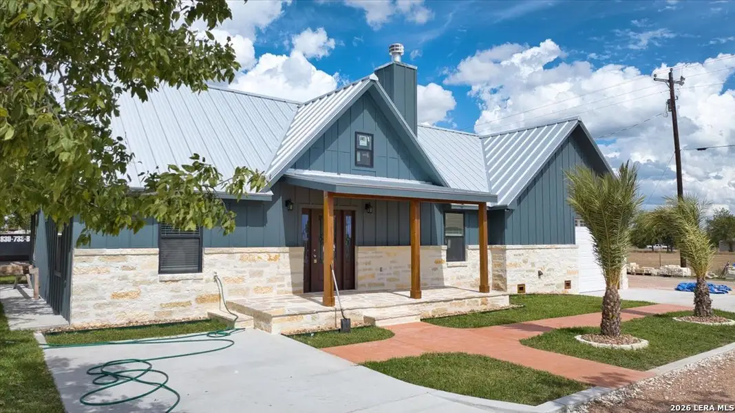 Front exterior of a new home in , Harper, TX, highlighting curb appeal (Image 1). Front exterior of a new home in , Harper, TX, highlighting curb appeal (Image 1).