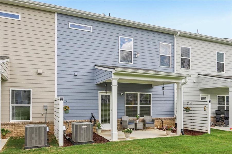 Exterior details and patio area of a home in Ellison Square, Sugar Hill (Image 29).