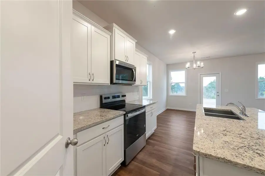Furnished interior view inside a new home in , Calhoun (Image 6).