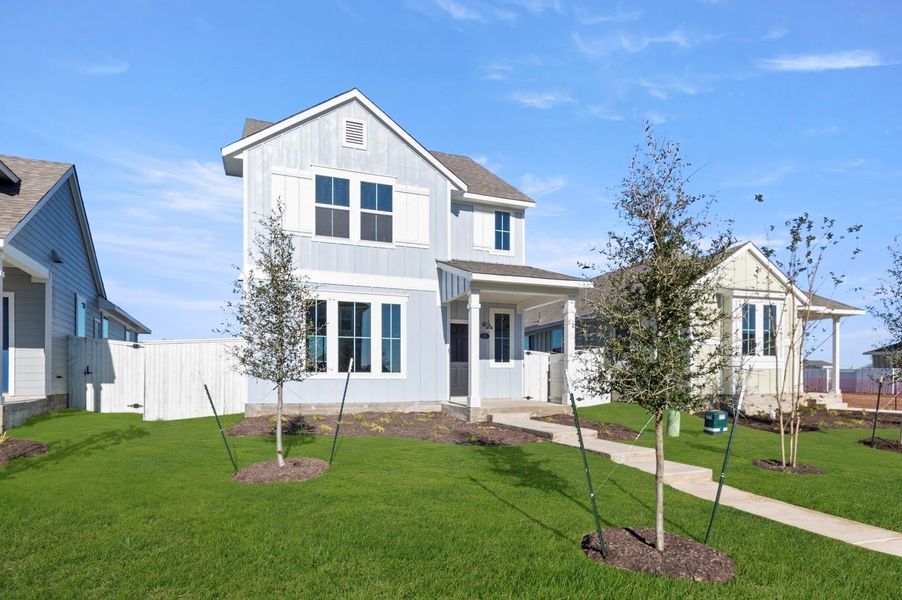 Front exterior of a new home in Harvest Ridge, Elgin, TX, highlighting curb appeal (Image 19).