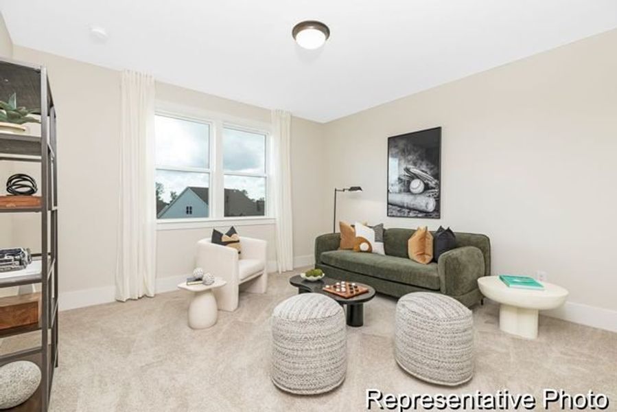 Representative furnished interior of a home built from the Bedford P by True Homes in Homecoming, Ravenel (Image 11).