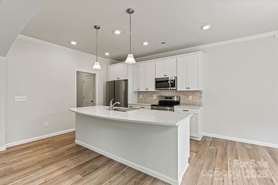 Furnished interior view inside a new home in , Charlotte (Image 12). Furnished interior view inside a new home in , Charlotte (Image 12).