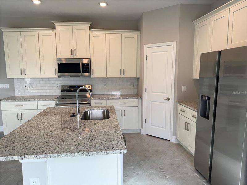 Furnished interior view inside a new home in , North Port (Image 7).