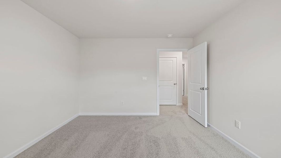 Spacious, unfurnished interior of a new home in Bentley Park, Greenwood (Image 23).