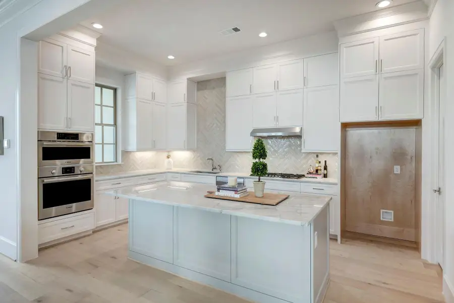 *Previous Model Home* Representative of an open layout kitchen, to be built with Thermador appliances.