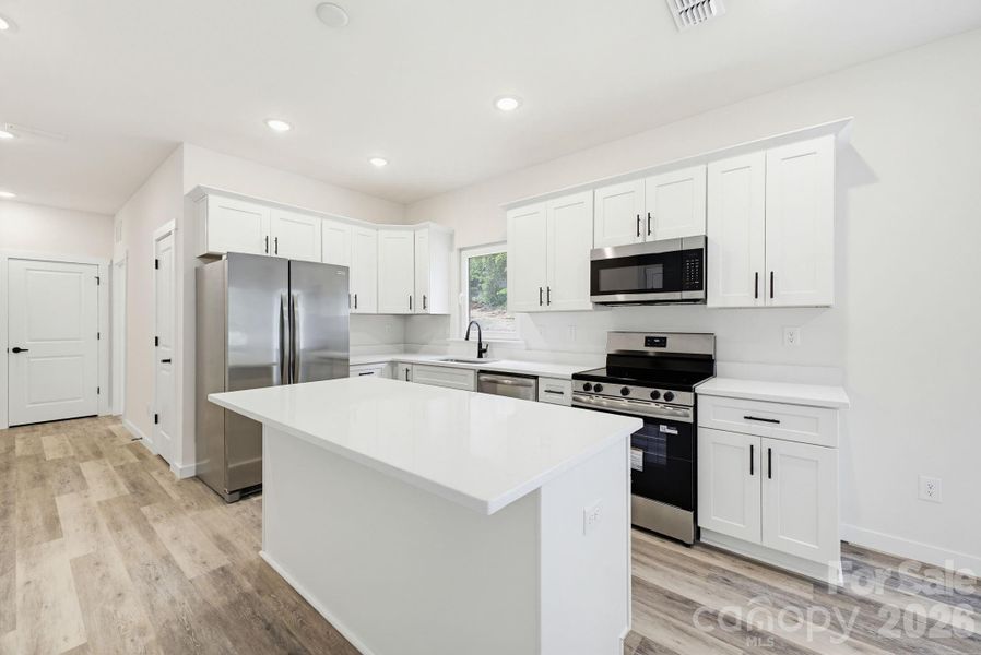 Furnished interior view inside a new home in , Hickory (Image 8).