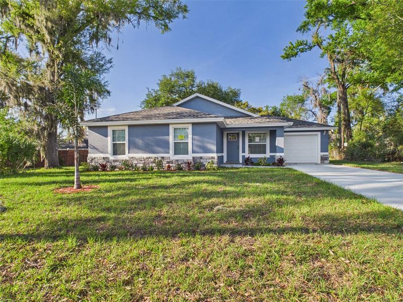 Front exterior of a new home in , Lakeland, FL, highlighting curb appeal (Image 18). Front exterior of a new home in , Lakeland, FL, highlighting curb appeal (Image 18).