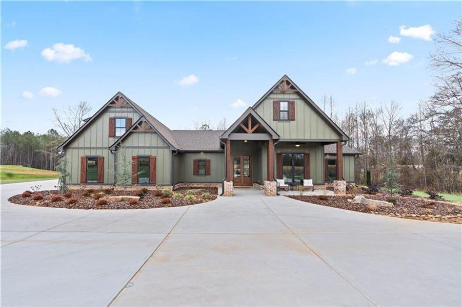 Front exterior of a new home in , Carrollton, GA, highlighting curb appeal (Image 26).