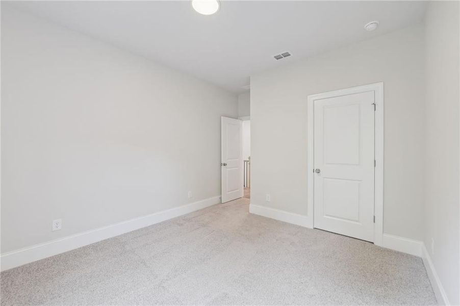 Spacious, unfurnished interior of a new home in Waterhaven, Cumming (Image 21).