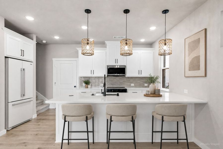 Furnished interior view inside a new home in Wildridge, Oak Point (Image 10).