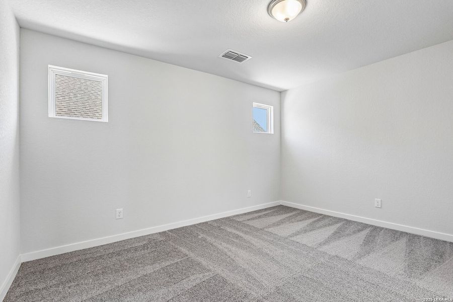 Spacious, unfurnished interior of a new home in Weston Oaks, San Antonio (Image 17).