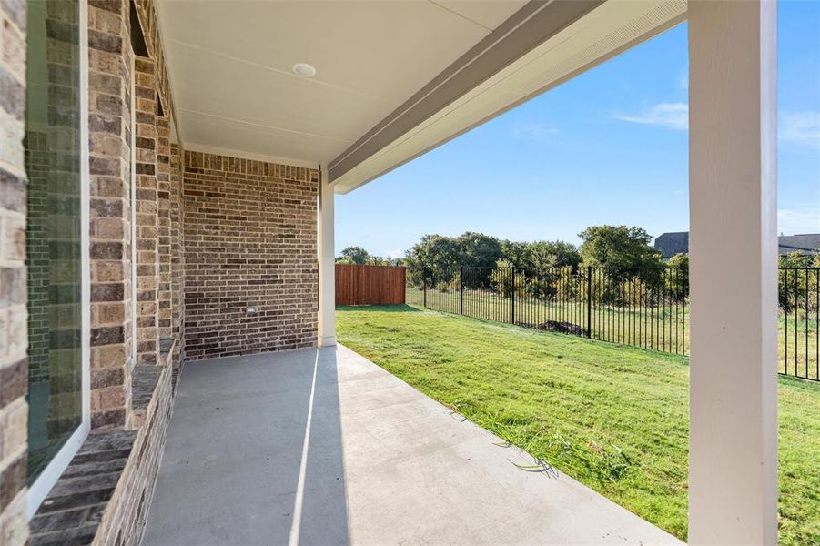 Exterior details and patio area of a home in Morningstar, Aledo (Image 21).