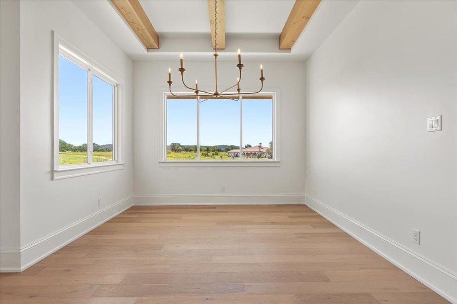The dining room is open to the kitchen and living room, perfect for entertaining. The dining room is open to the kitchen and living room, perfect for entertaining.