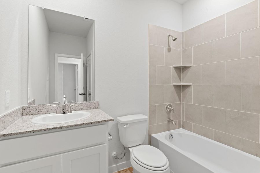 Furnished interior view inside a new home in Barrett Crossing, Crosby (Image 9).