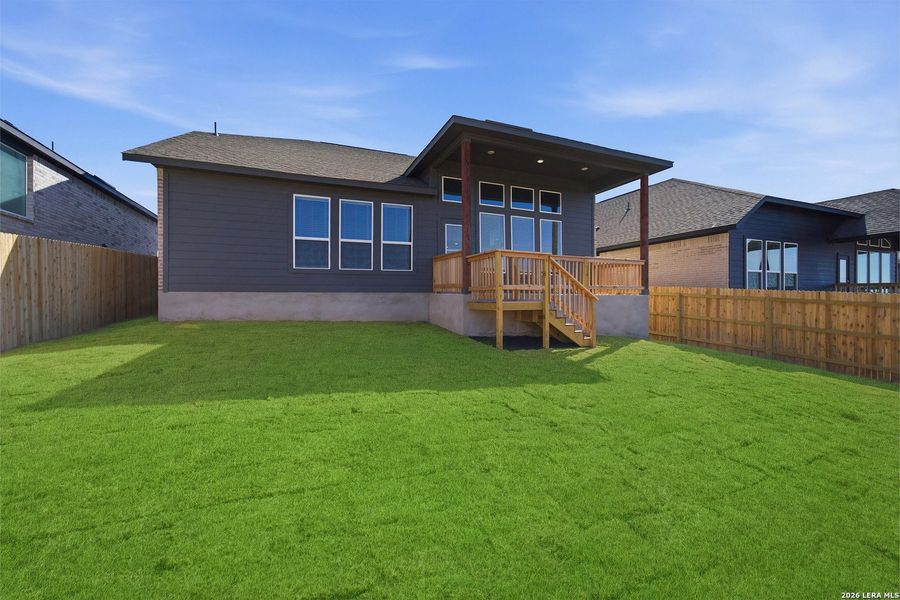Exterior details and patio area of a home in The Woodlands at Medina Hills, Mico (Image 3).