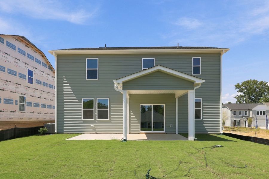 Exterior details and patio area of a home in Neill's Pointe, Angier (Image 20).