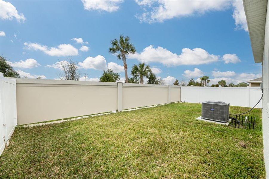 covered patio with fenced yard