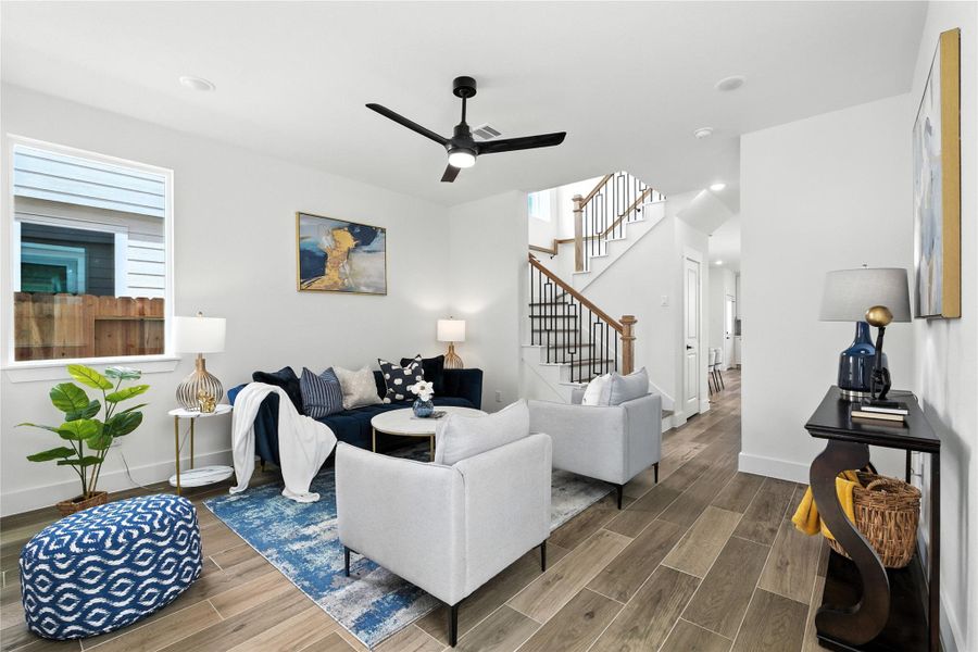 Welcome to the stunning 131 South Virginia! Come on in! The living room features recessed lighting, a ceiling fan, and a storage closet located under the stairs too! Welcome to the stunning 131 South Virginia! Come on in! The living room features recessed lighting, a ceiling fan, and a storage closet located under the stairs too!