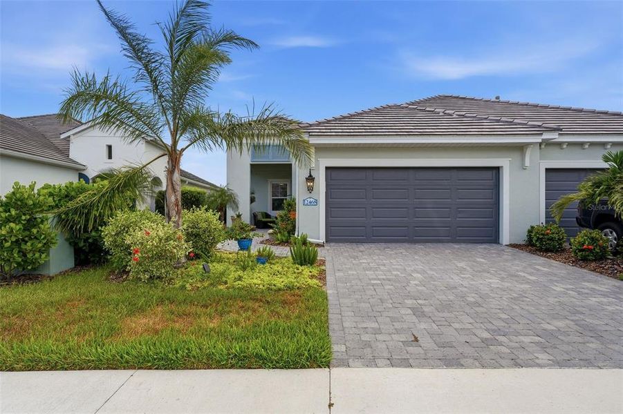 Front exterior of a new home in , Venice, FL, highlighting curb appeal (Image 20).