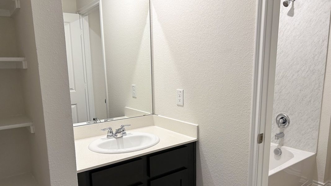 Representative furnished interior of a home built from the GARLAND by D.R. Horton in Northspur, Forney (Image 8).