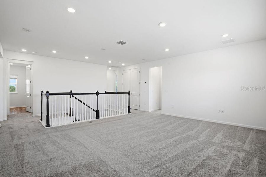 Spacious, unfurnished interior of a new home in Firethorn, Parrish (Image 22).