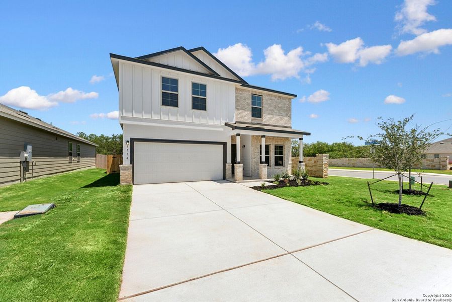 Front exterior of a new home in Cinco Lakes, San Antonio, TX, highlighting curb appeal (Image 1). Front exterior of a new home in Cinco Lakes, San Antonio, TX, highlighting curb appeal (Image 1).