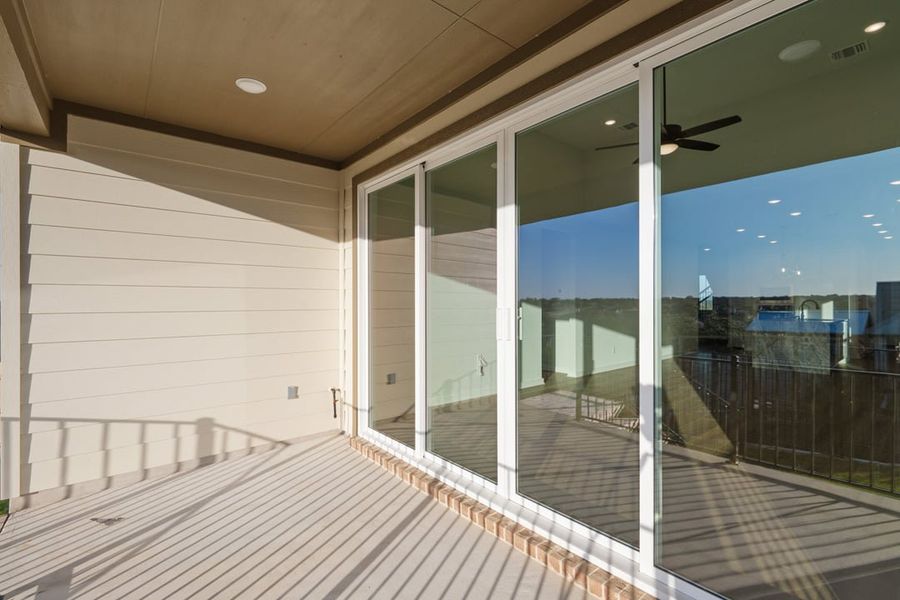 Exterior details and patio area of a home in Terrace Collection at Lariat, Liberty Hill (Image 4).