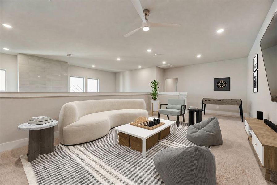 Spacious loft area featuring a vaulted ceiling with recessed lighting and a ceiling fan