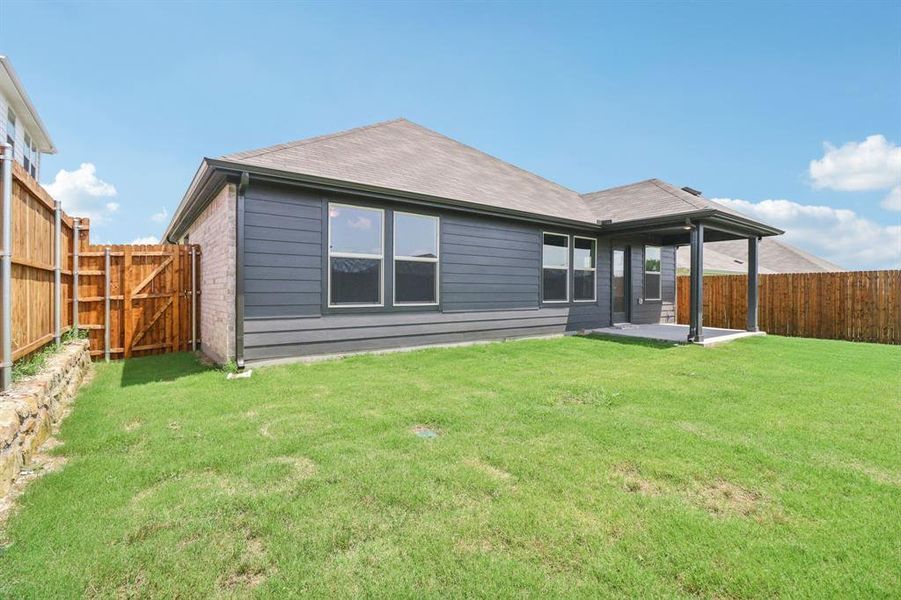 Front exterior of a new home in Westmoor, Sherman, TX, highlighting curb appeal (Image 21).
