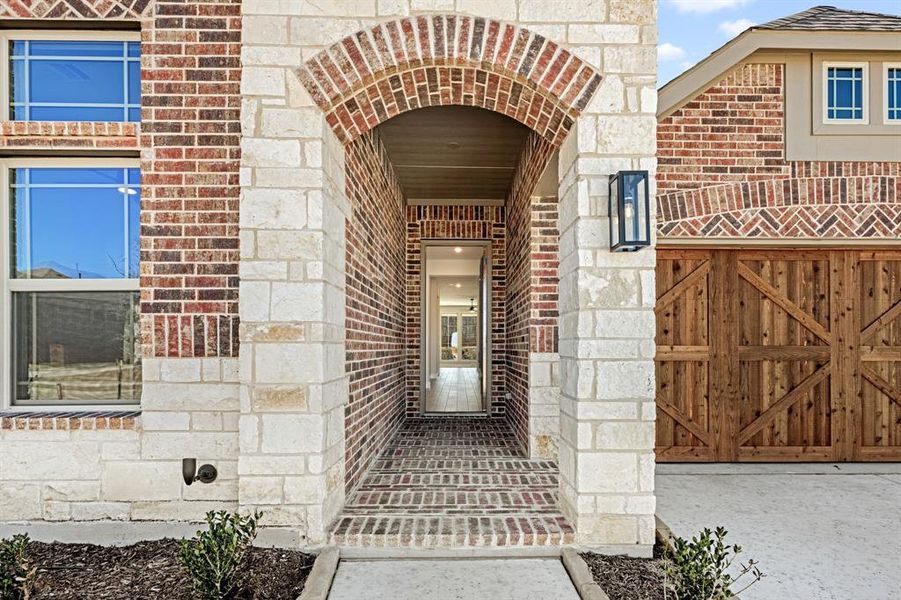 Exterior details and patio area of a home in The Oaks, Red Oak (Image 3).
