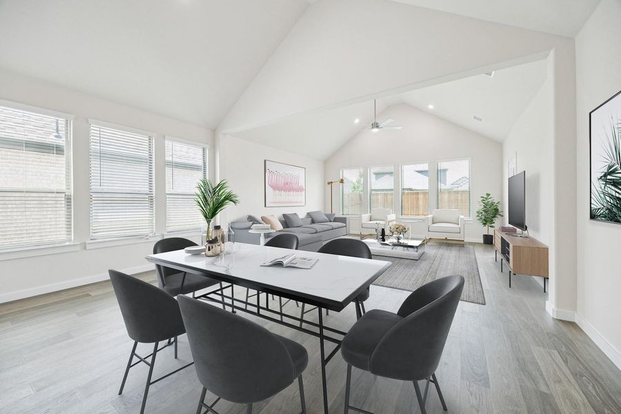 Vast vaulted ceilings complement an airy open-concept living space with ample natural light. Vast vaulted ceilings complement an airy open-concept living space with ample natural light.