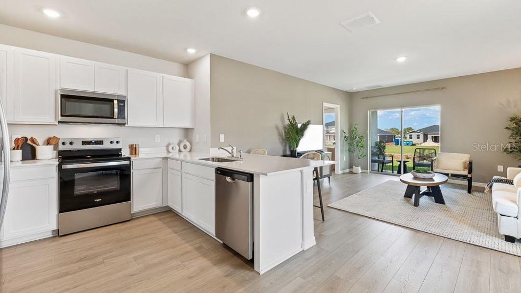 Furnished interior view inside a new home in Oakfield Trails, Parrish (Image 5).