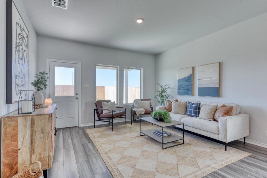 Representative furnished interior of a home built from the Ladybird by Ashton Woods in Meadows at Hennersby Hollow 40's, San Antonio (Image 7).