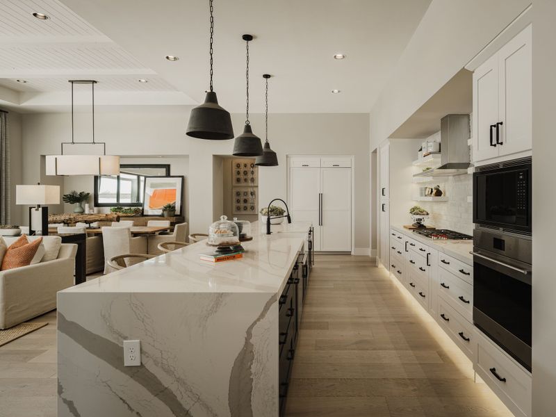 Representative furnished interior of a home built from the Plan 6002 by Camelot Homes in Stone Crest, Gilbert (Image 11).