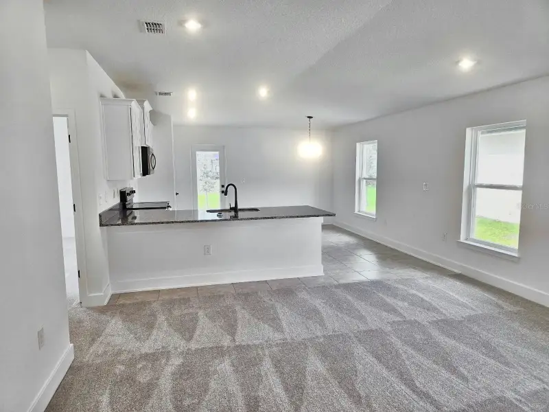 Spacious, unfurnished interior of a new home in Harmony Central, St. Cloud (Image 8). Spacious, unfurnished interior of a new home in Harmony Central, St. Cloud (Image 8).