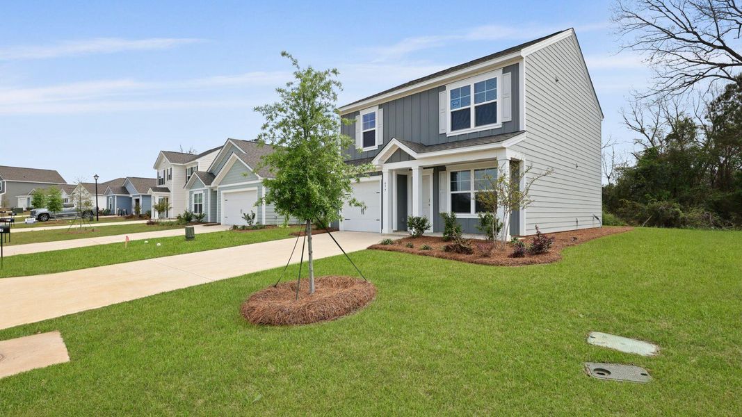 Front exterior of a new home in Center Pointe, Santee, SC, highlighting curb appeal (Image 2).
