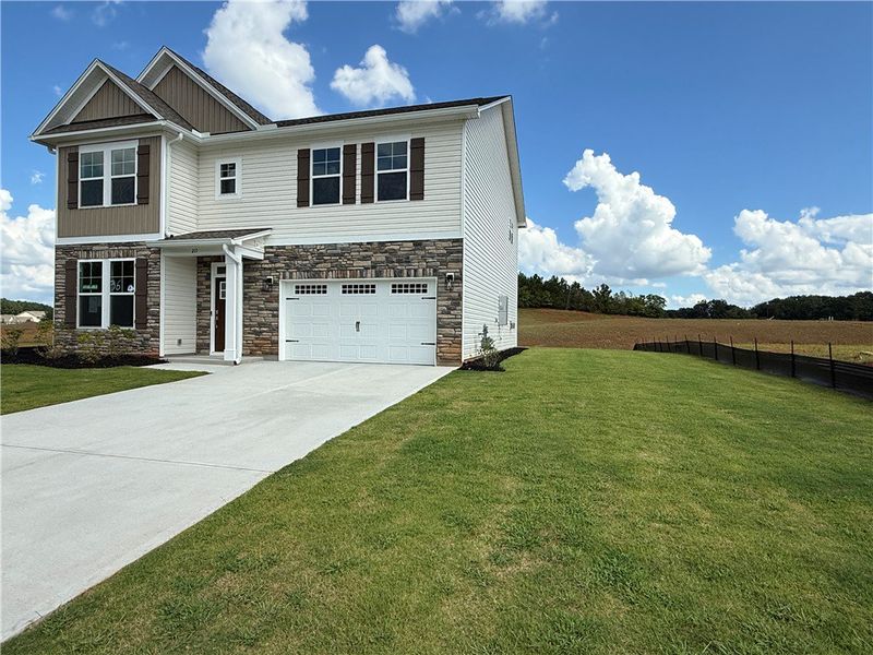A newly constructed residence features a blend of A newly constructed residence features a blend of