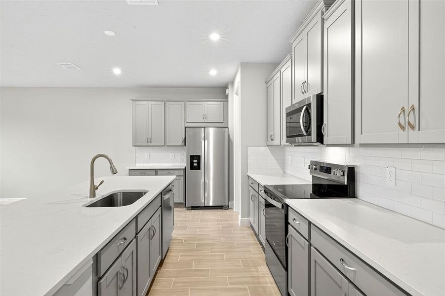 Furnished interior view inside a new home in Windwater, Parrish (Image 8).