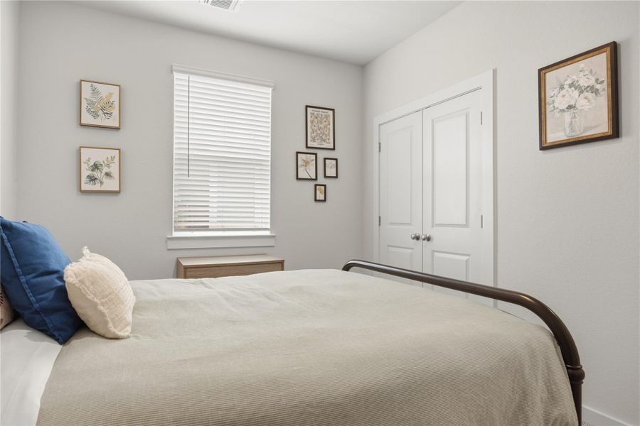 Bedroom featuring a closet