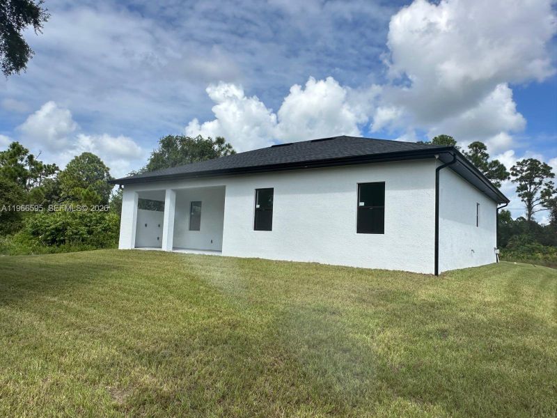 Exterior details and patio area of a home in , Lehigh Acres (Image 22).