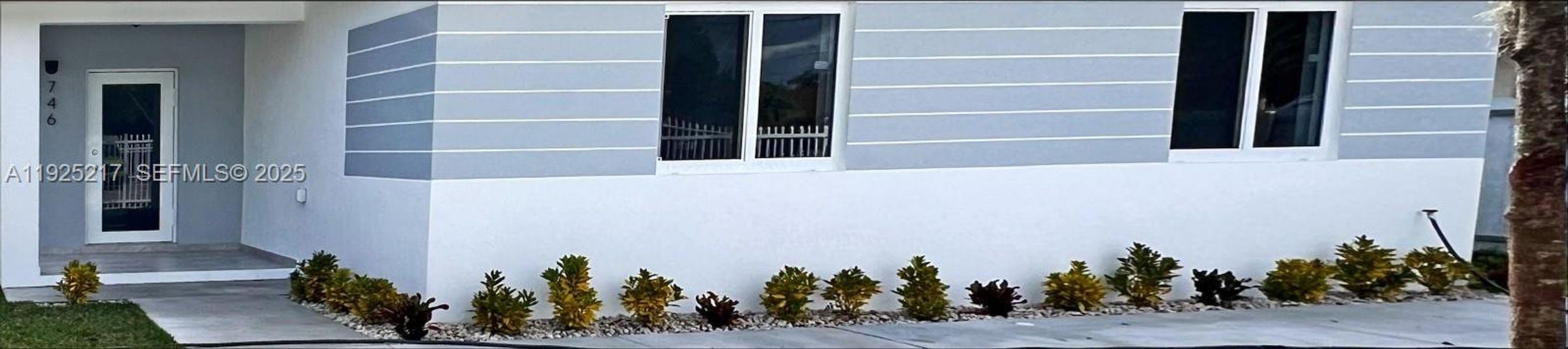 Exterior details and patio area of a home in , Miami (Image 1). Exterior details and patio area of a home in , Miami (Image 1).