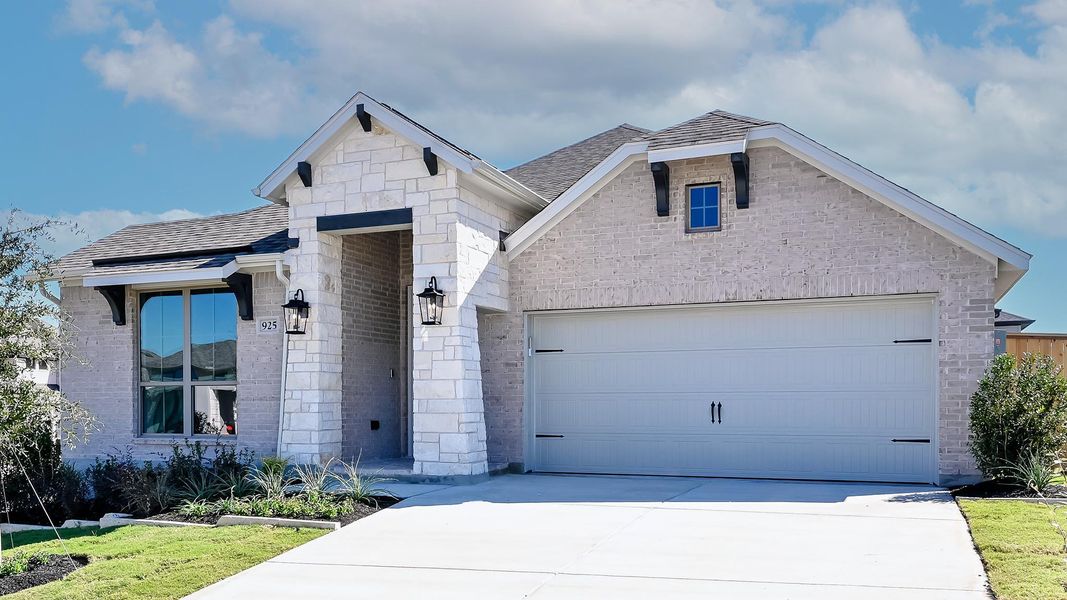 Front exterior of a new home in La Cima 50', San Marcos, TX, highlighting curb appeal (Image 1). Front exterior of a new home in La Cima 50', San Marcos, TX, highlighting curb appeal (Image 1).