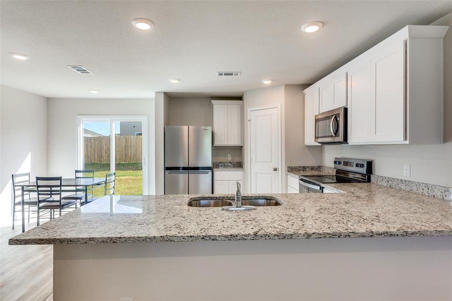 Furnished interior view inside a new home in Courtland Place, Cleburne (Image 6).