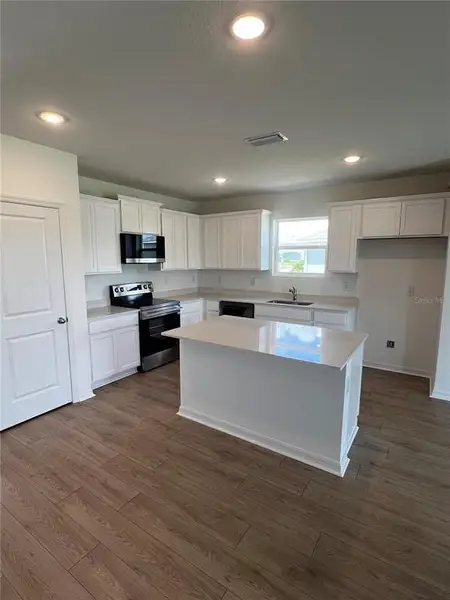 Furnished interior view inside a new home in , Parrish (Image 4).