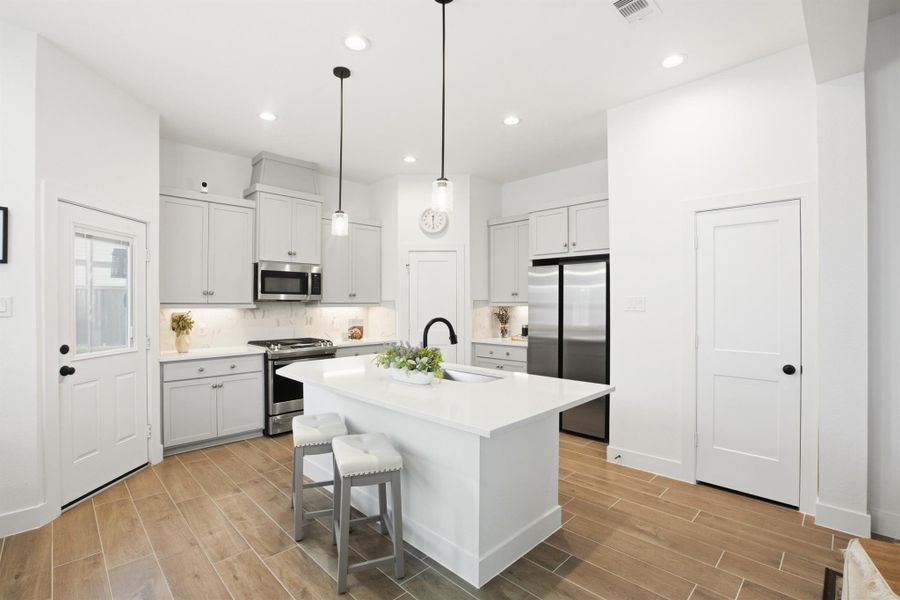 Furnished interior view inside a new home in , Cypress (Image 14).