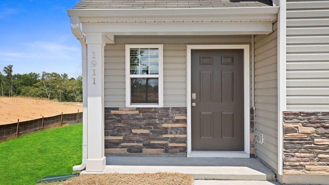 Exterior details and patio area of a home in Harrier Point, Woodruff (Image 4).