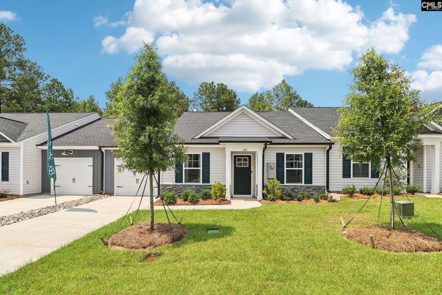Front exterior of a new home in Piney Woods Bluff, Columbia, SC, highlighting curb appeal (Image 1). Front exterior of a new home in Piney Woods Bluff, Columbia, SC, highlighting curb appeal (Image 1).