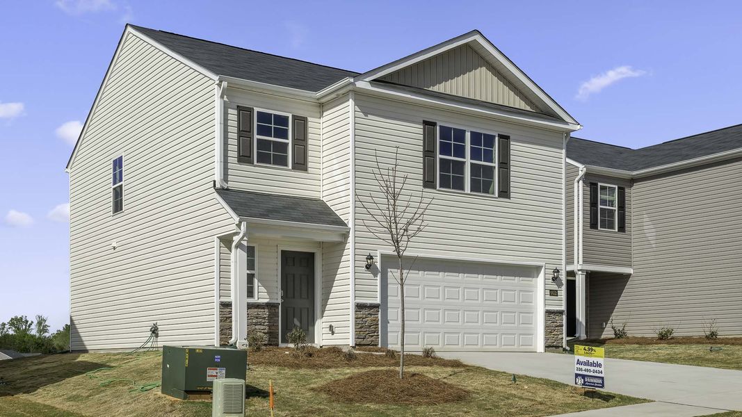 Front exterior of a new home in Chandler Pointe, Rural Hall, NC, highlighting curb appeal (Image 14).